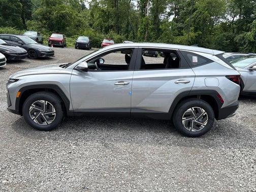 Shimmering Silver 2026 Hyundai TUCSON Hybrid Blue SE