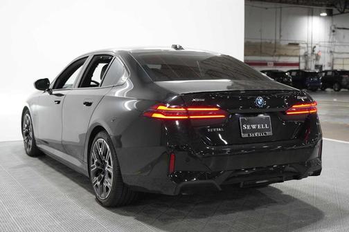 Black Sapphire Metallic 2026 BMW 550e xDrive