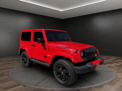 Red 2016 Jeep Wrangler Sahara