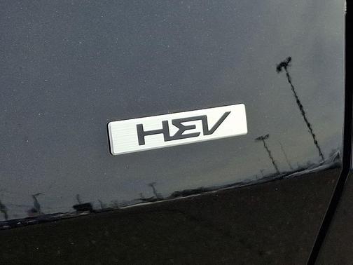 Fusion Orange 2026 Kia Sportage Hybrid EX