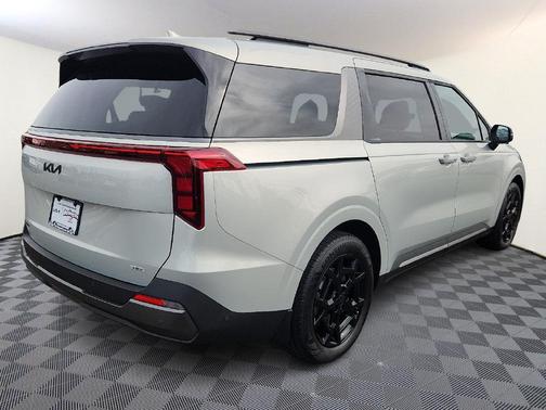 Ivory Silver 2027 Kia Carnival SX