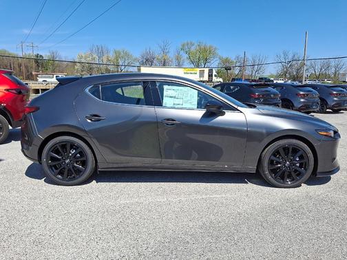 Machine Gray Metallic 2026 Mazda Mazda3 AWD w/Premium Package
