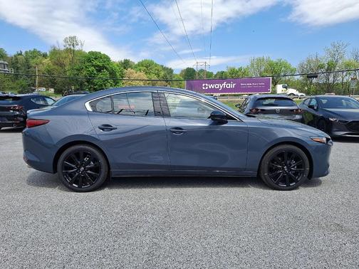Polymetal Gray Metallic 2026 Mazda Mazda3 AWD w/Premium Package