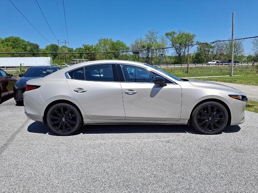 Platinum Quartz Metallic 2026 Mazda Mazda3 AWD w/Premium Package