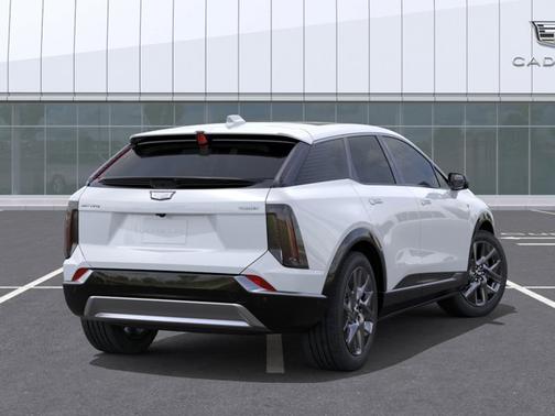 Vibrant White Tricoat 2026 Cadillac OPTIQ Premium Luxury