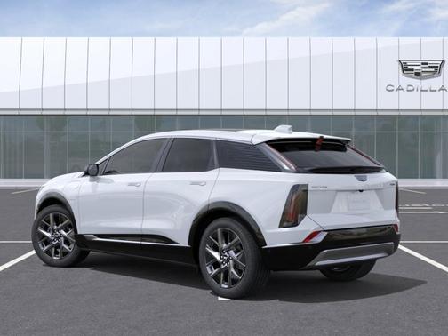 Vibrant White Tricoat 2026 Cadillac OPTIQ Premium Luxury