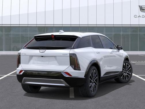 Vibrant White Tricoat 2026 Cadillac OPTIQ Premium Sport