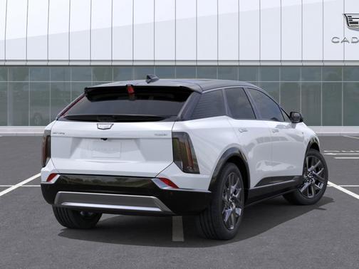 Vibrant White Tricoat 2026 Cadillac OPTIQ Premium Luxury