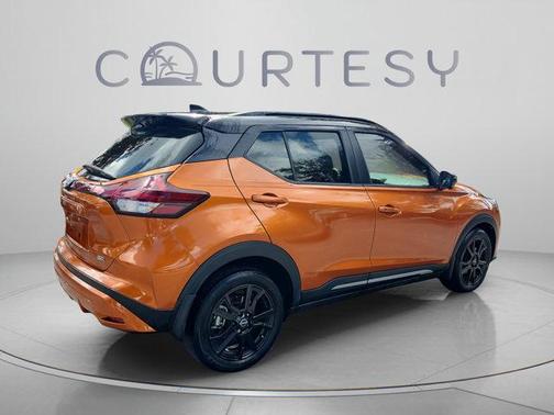 Monarch Orange / Super Black 2024 Nissan Kicks SR