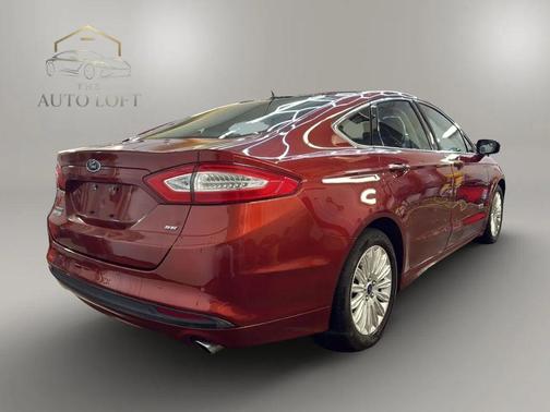 Sunset Metallic 2014 Ford Fusion Energi SE Luxury