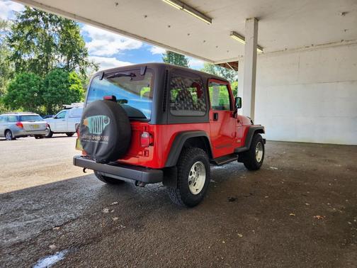 Flame Red 1997 Jeep Wrangler Sport