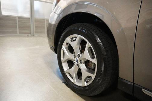 Tan 2017 Subaru Forester 2.5i Touring