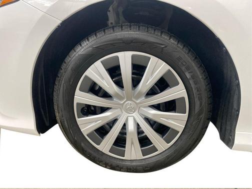 Super White 2019 Toyota Camry Hybrid LE