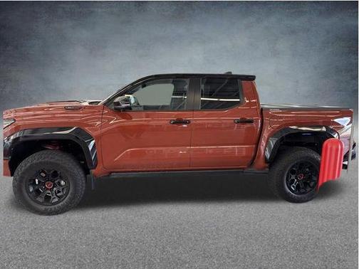 Orange 2024 Toyota Tacoma Hybrid TRD Pro