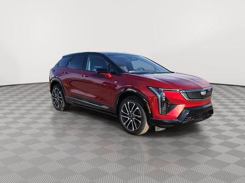 Radiant Red Tintcoat 2026 Cadillac OPTIQ Premium Sport