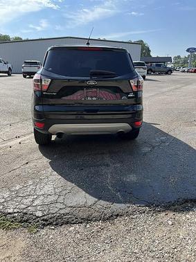 Ruby Red Metallic Tinted Clearcoat 2017 Ford Escape SE