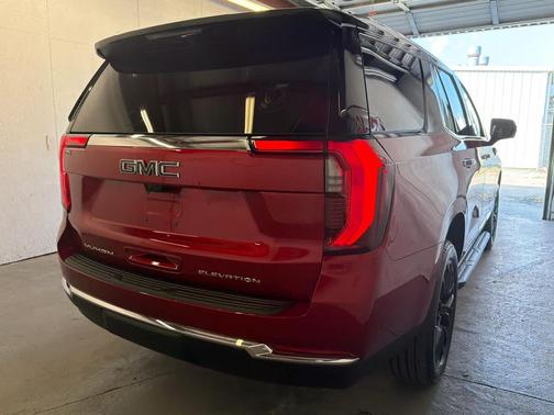 Volcanic Red Tintcoat 2026 GMC Yukon 4WD Elevation