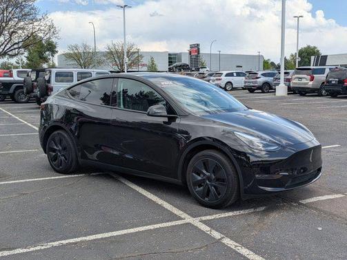 Solid Black 2025 Tesla Model Y Long Range Dual Motor All-Wheel Drive