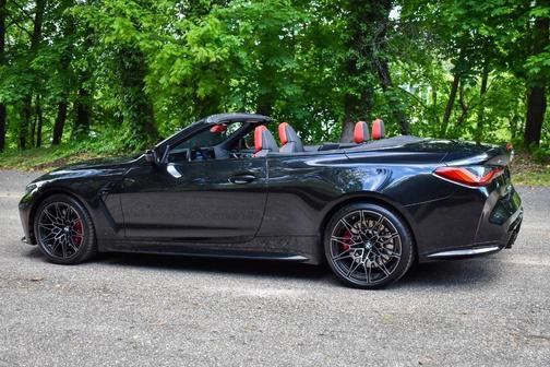 Black Sapphire Metallic 2024 BMW M4 Competition xDrive