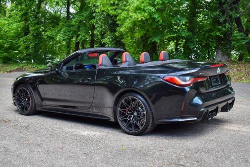 Black Sapphire Metallic 2024 BMW M4 Competition xDrive