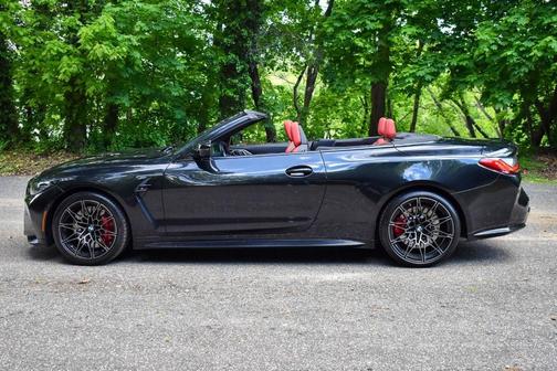 Black Sapphire Metallic 2024 BMW M4 Competition xDrive