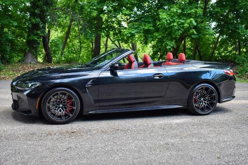Black Sapphire Metallic 2024 BMW M4 Competition xDrive