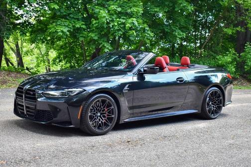 Black Sapphire Metallic 2024 BMW M4 Competition xDrive