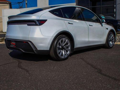 Pearl White Multi-Coat 2026 Tesla Model Y Long Range Launch Series