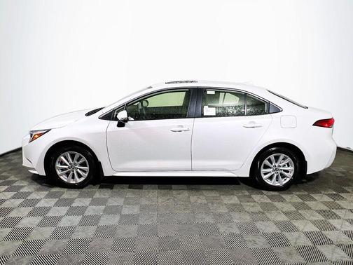 Wind Chill Pearl 2026 Toyota Corolla Hybrid XLE