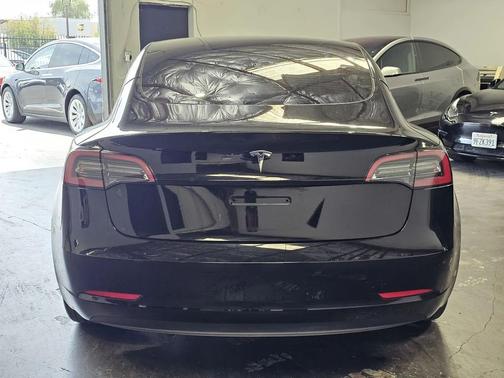 Solid Black 2023 Tesla Model 3 Standard Range
