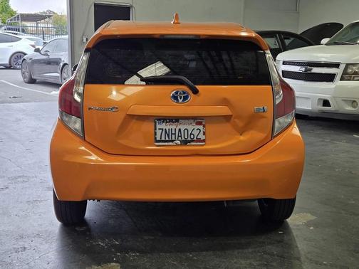 Tangerine Splash Pearl 2015 Toyota Prius c Four