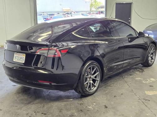 black 2023 Tesla Model 3 Standard Range