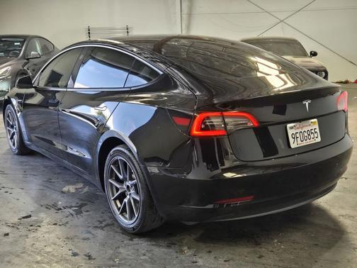 black 2023 Tesla Model 3 Standard Range