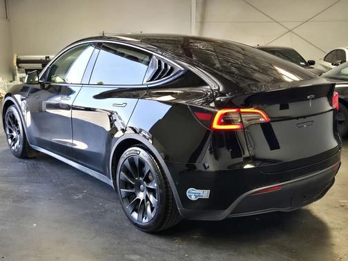 Solid Black 2021 Tesla Model Y Standard Range Rear-Wheel Drive