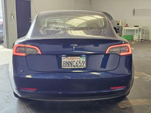 blue 2023 Tesla Model 3 Standard Range