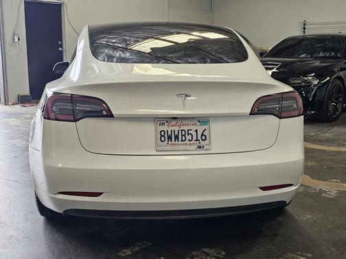 white 2021 Tesla Model 3 Standard Range Plus