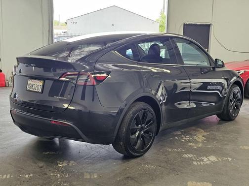gray 2025 Tesla Model Y Long Range Dual Motor All-Wheel Drive