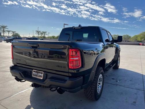 Diamond Black Crystal Pearlcoat 2025 RAM 1500 RHO Crew Cab 4x4 5'7' Box