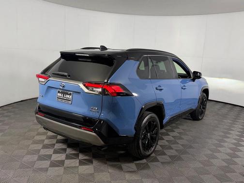 Cavalry Blue/Midnight Black Metallic 2024 Toyota RAV4 Hybrid SE
