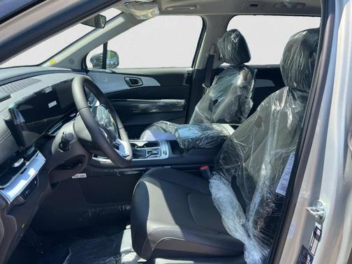 Ivory Silver 2026 Kia Carnival SX