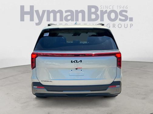 Ivory Silver 2026 Kia Carnival SX