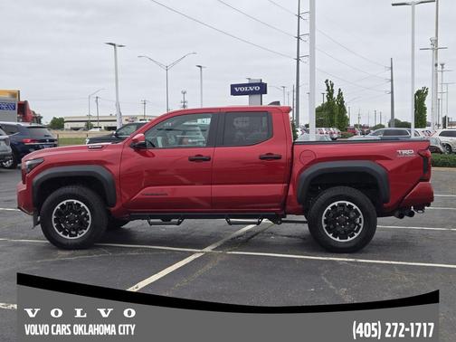 Red 2025 Toyota Tacoma Hybrid TRD