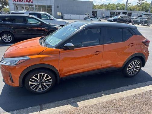 Monarch Orange / Super Black 2023 Nissan Kicks SV
