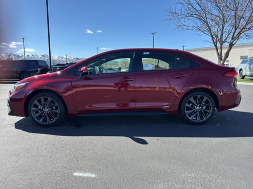 Ruby Flare Pearl 2026 Toyota Corolla Hybrid SE