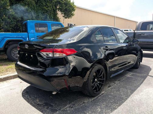 Midnight Black Metallic 2025 Toyota Corolla LE