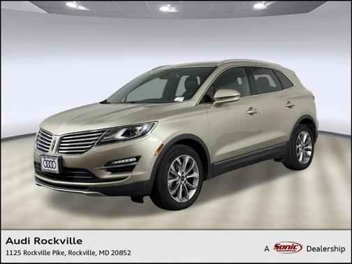 Gold 2015 Lincoln MKC Base