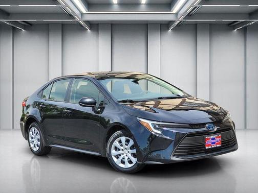 Midnight Black Metallic 2024 Toyota Corolla Hybrid LE