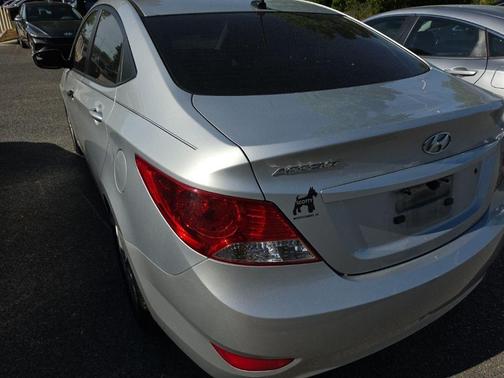 Ironman Silver Metallic 2014 Hyundai Accent GLS