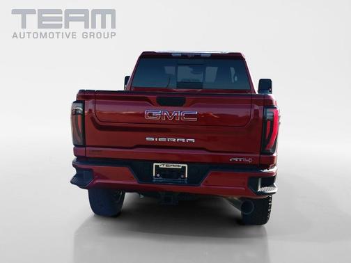 Volcanic Red 2024 GMC Sierra 2500 AT4