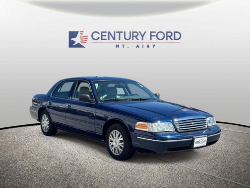 Blue 2004 Ford Crown Victoria LX